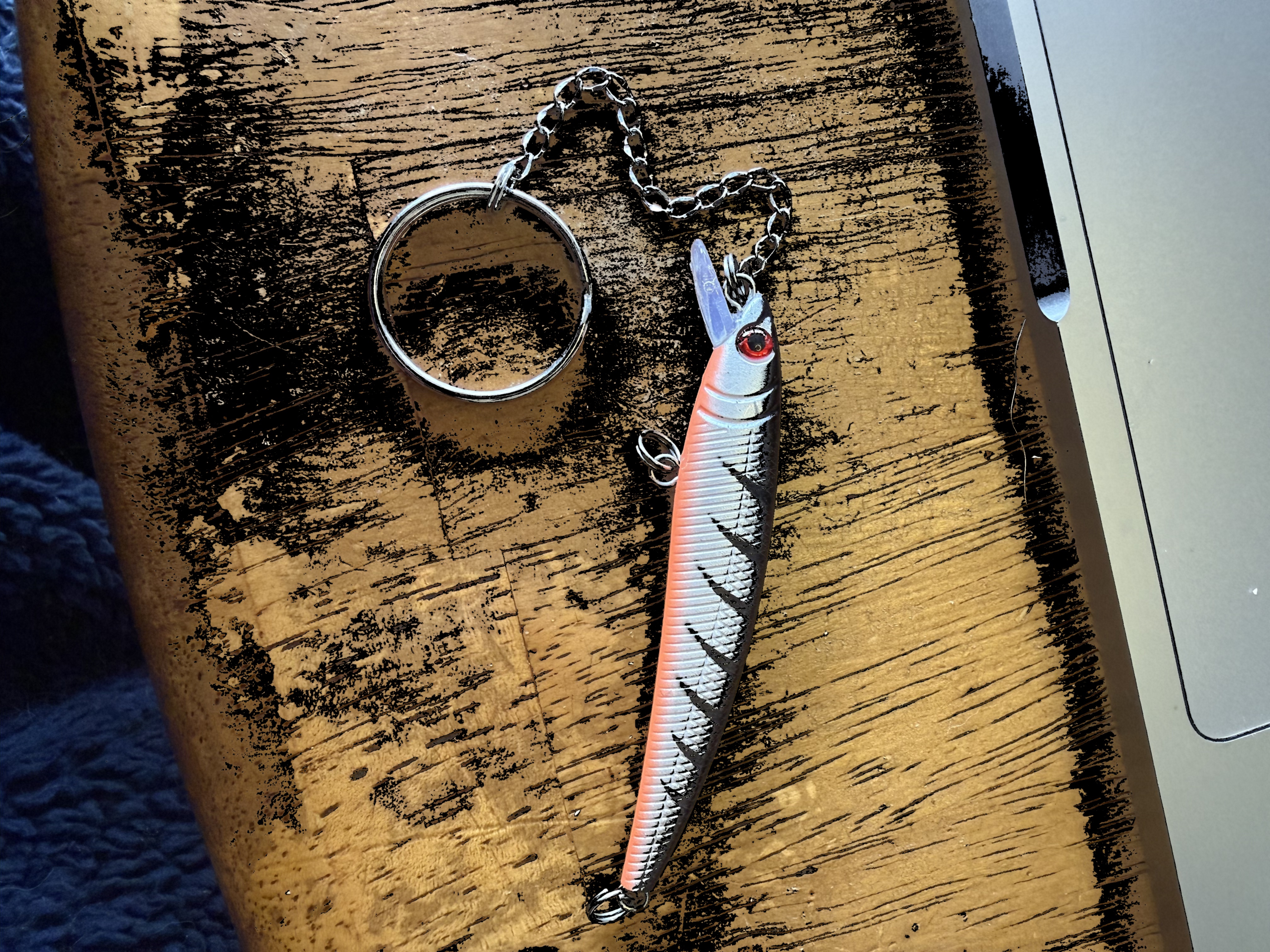 Vintage lure keychain close-up with chain